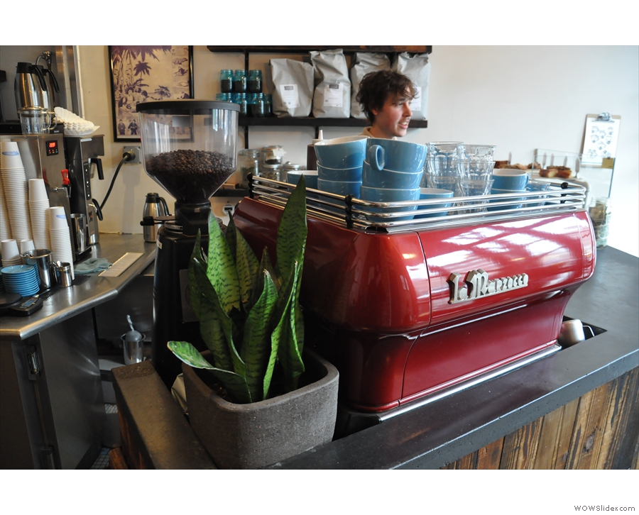 The bright-red La Marzocco and its blue cups provide a splash of colour.