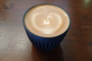 Here's a flat white from a recent visit, once again in my HuskeeCup.