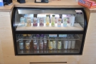 ... soft drinks (chiller cabinet by the till)...
