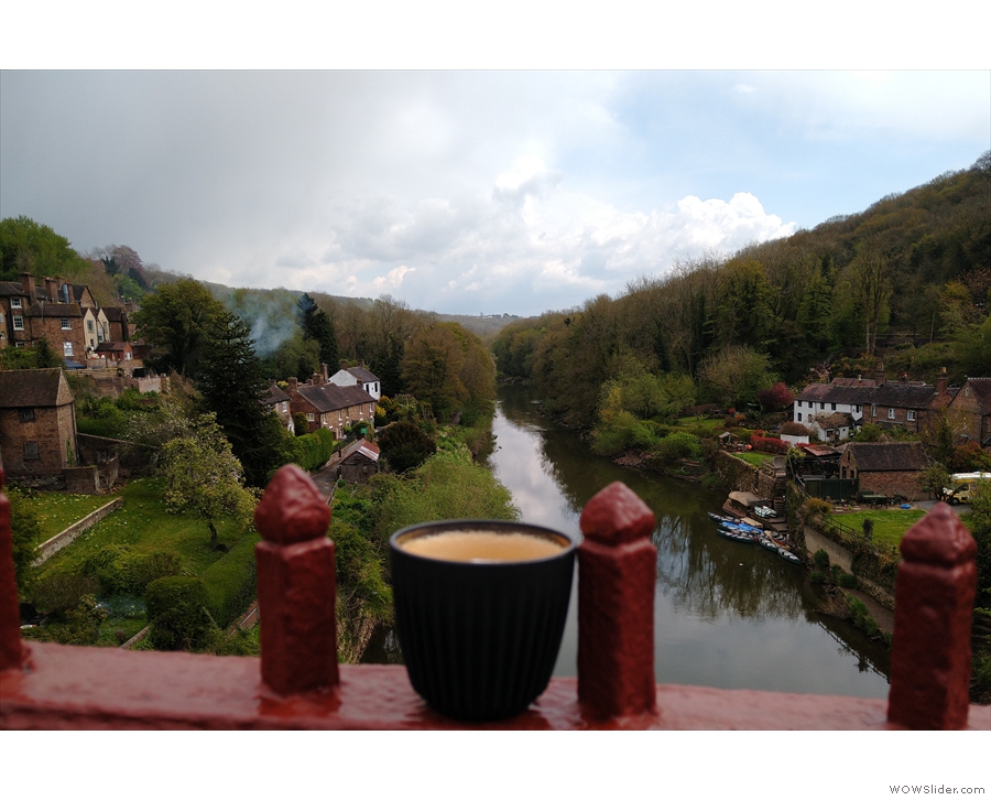 Here's my coffee on the bridge, enjoying the view, looking east, down the river.