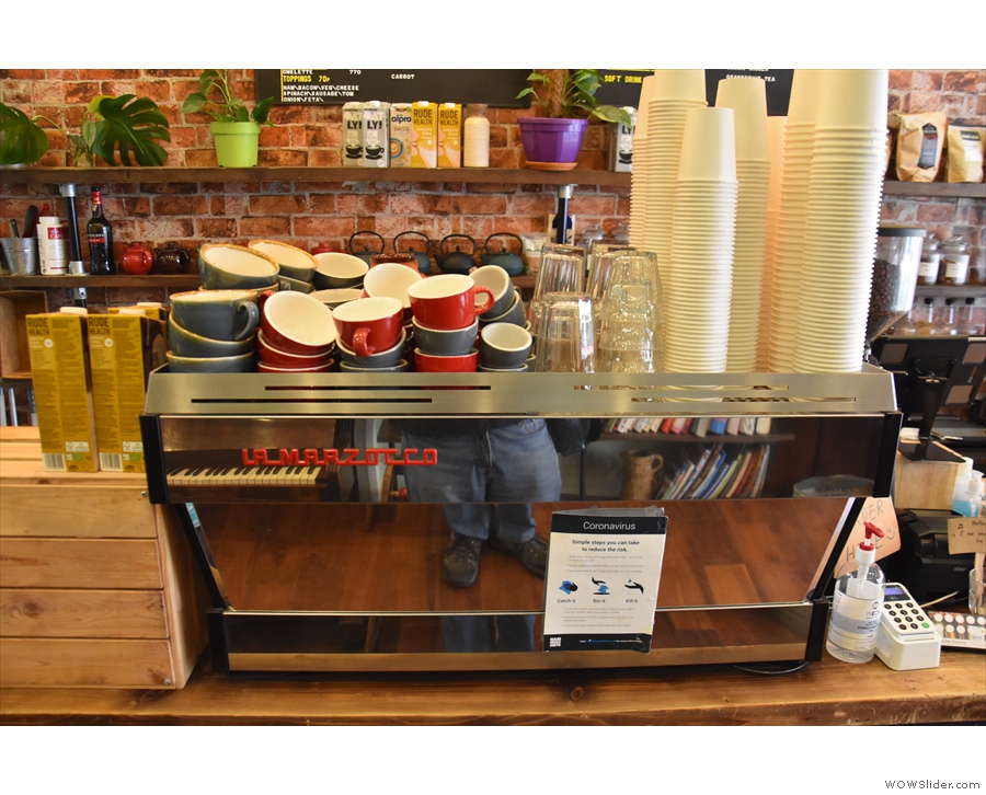 At the other end of the counter is the La Marzocco Linea espresso machine.
