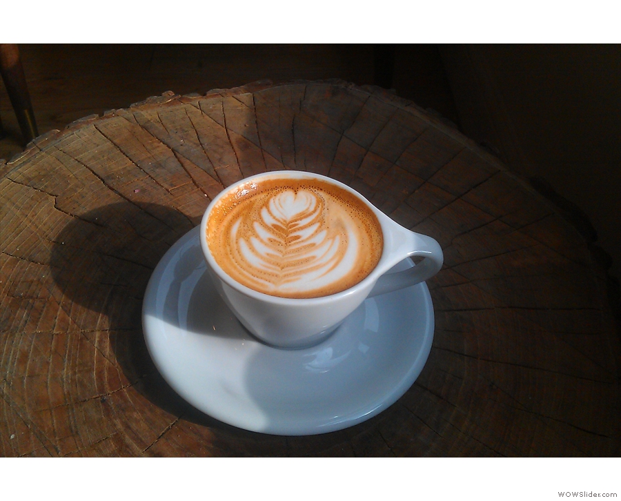 And here it is, basking in the morning sun... Glorious latte-art by Elysa.