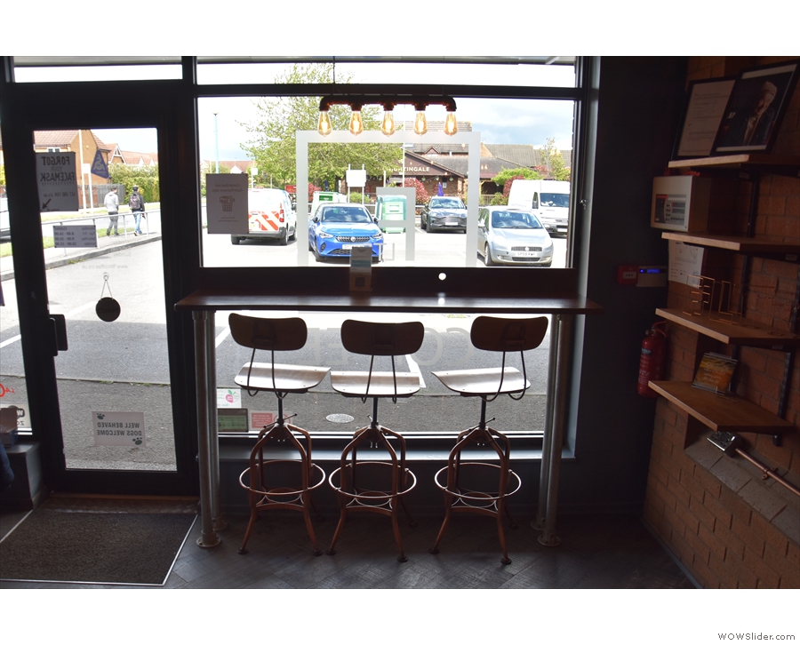 The only seating in the left-hand part of FLTR Coffee is this three-person window-bar.
