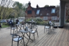 ... the back of the spacious terrace, where you are welcome to sit once you've ordered.