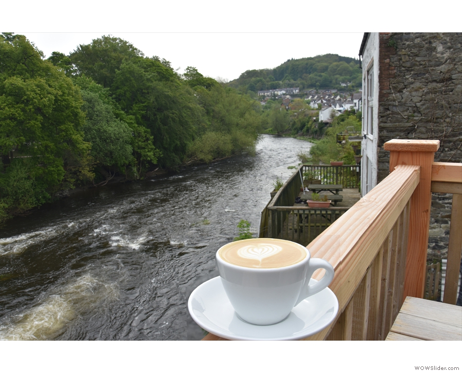 I'll leave you with a shot of my flat white, enjoying the view down the river.