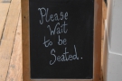 A polite reminder from the A-board, in case you sneaked past the staff.