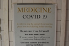 Stepping inside, a small foyer holds the usual COVID-19 instructions...