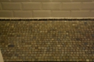 ... and neat mosaic-style floor tiling.