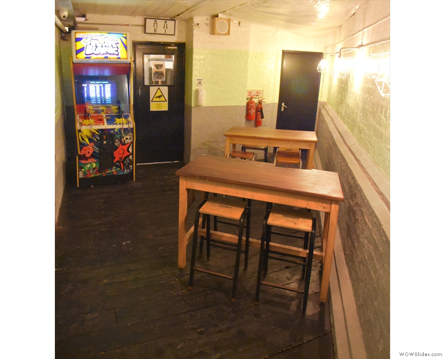 ... although now it has a couple of tables. The left-hand of the two doors leads to the...