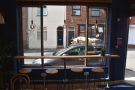 There's a four-person window-bar on the right, looking out onto Catherine Street...