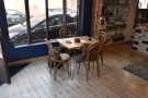 ... while the window onto Charlotte Street has a solitary four-person table.