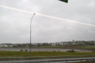 By now, the bus was approaching the southern outskirts of Reykjavik, before...