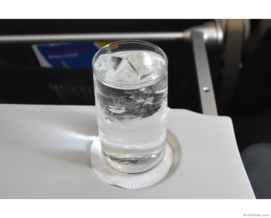 Meanwhile, in Club Europe, our in-flight service started with drinks: sparkling water...