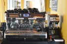 The Nuova Simonelli espresso machine is side on to the counter...
