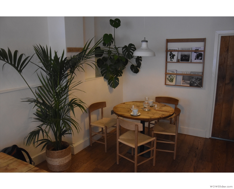 And, right at the back, a four-person table tucked in amongst the plants.