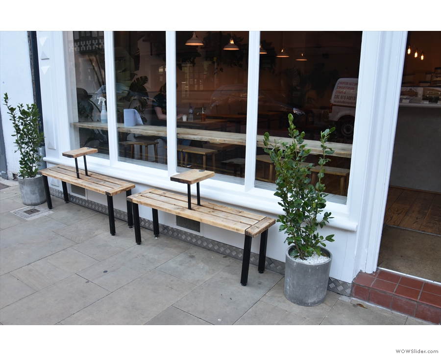 I like the design of the two outside benches with their in-built coffee tables.