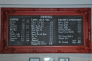 ... the coffee menu from the back wall.