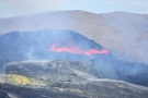 ... time went on, including several times when the lava spilled over the north edge of...