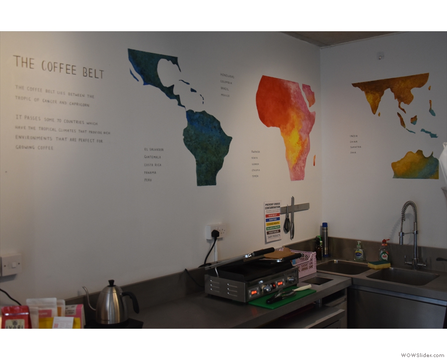 Back inside, a map of the world's coffee-growing belt graces the walls.