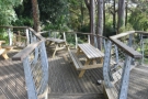 Towards the back, on the right, steps lead down to a smaller, lower teir of decking...