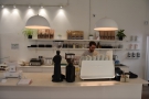 You order and pay at the counter (left) while the espresso machine is on the right.