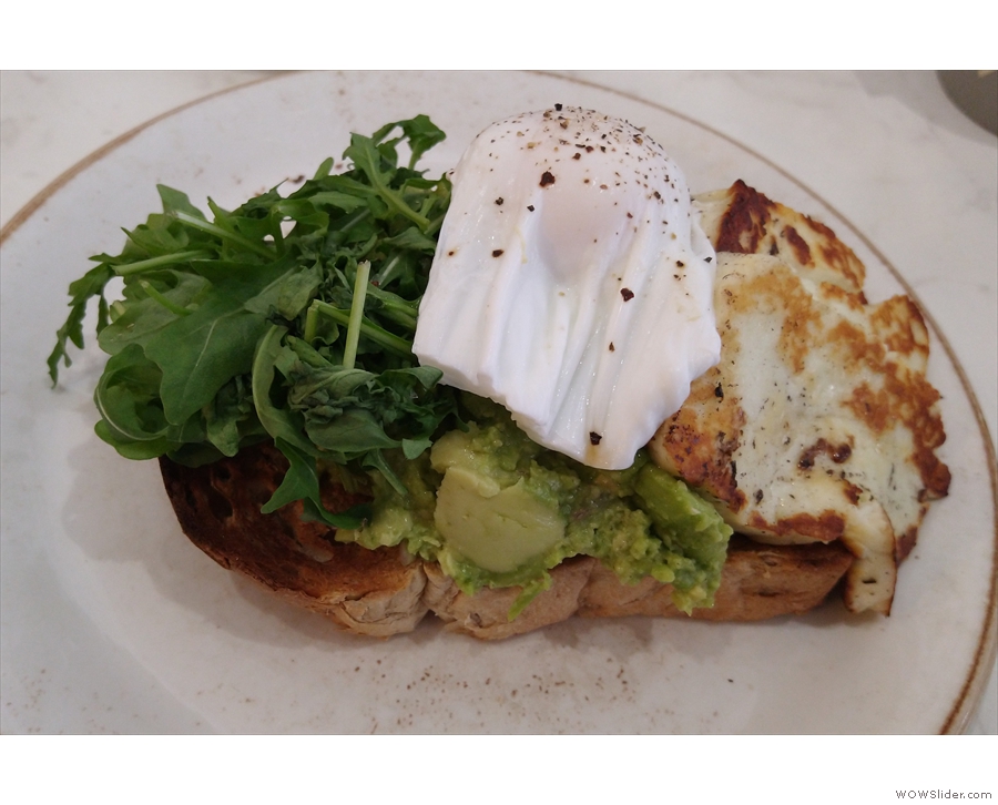 ... and breakfast: smashed avocado, halloumi and poached egg on toast for me...