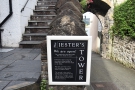 The tower is known as The Jester's Tower and the coffee shop is run by the town jester.