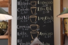 The concise espresso-based menu is on the wall at the back of the counter...