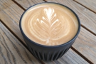 I started off with a flat white in my HuskeeCup, which I enjoyed while sitting outside...