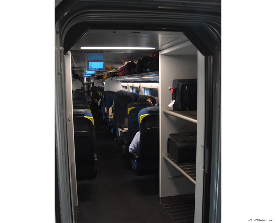 ... where you'll find a large set of luggage racks (there's another set at the other end).