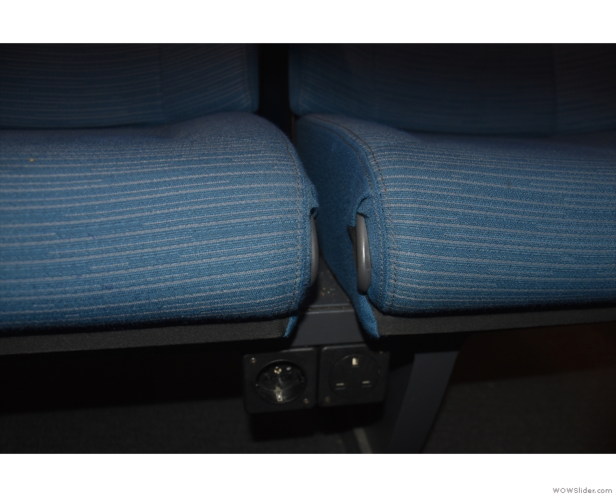 ... and each pair of seats, whether table or airline, has two power sockets underneath.