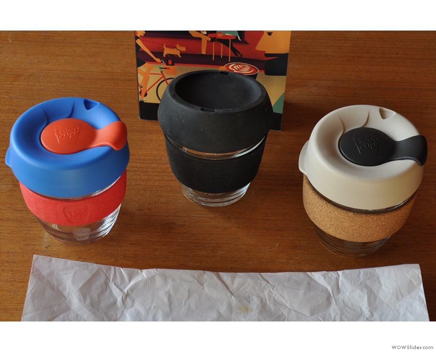 The spoils of war: my two KeepCups flank JOCO Cup, the London Coffee Guide providing the backdrop.