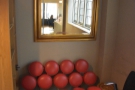 ... this rather interesting sofa under the mirror on the back wall.