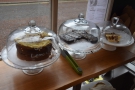 The cakes, meanwhile, are displayed in the window by the door...