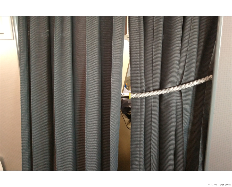 ... since one of the cabin crew's first jobs is to pull the curtains across.