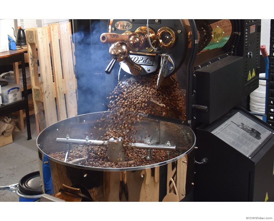 ... at the bottom of the roaster and the hot, roasted beans come tumbling out...