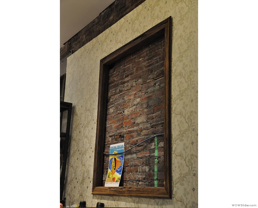 There are some nice features, such as this framed section of bare-brick wall.