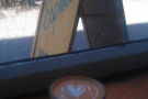Here my cortado admires the sign outside...