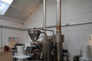 The centrepiece is the Loring S15 Falcon roaster, its twin chimneys towering above it.