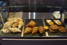 The final display case, next to the till, holds the pastries...