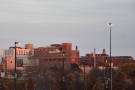 Looking east, Maine Medical Center is lit up by the setting sun.