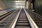 ... the escalators (for B gates, travel in the middle). This is the first of two escalators...