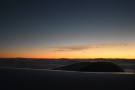 ... to see the glow of the sunset above the clouds.