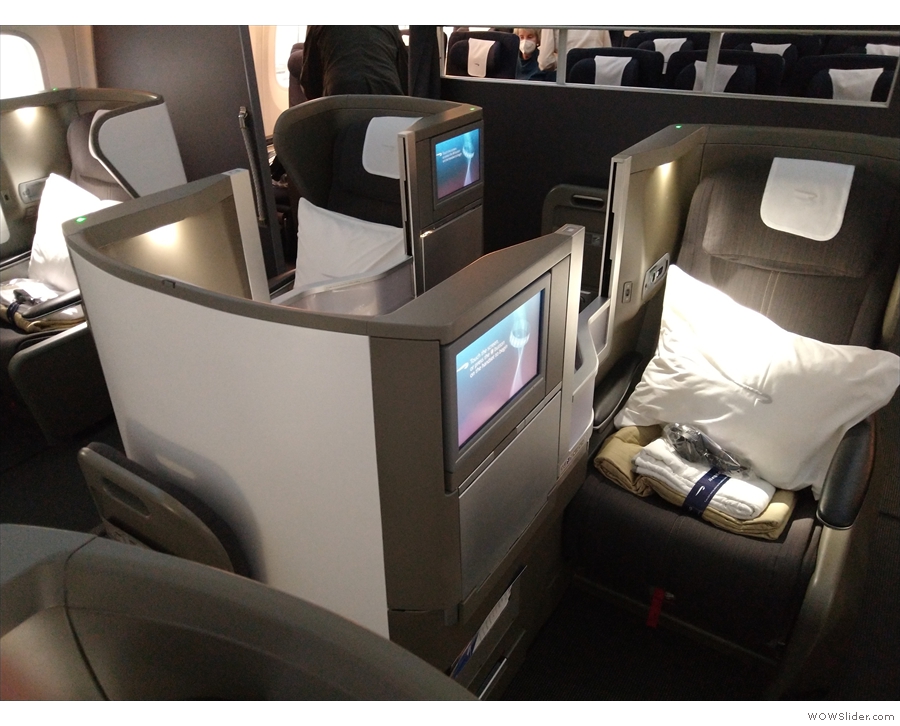 ... of the old-style British Airways top-and-tail seats, arranged in a 2-3-2 configuration.