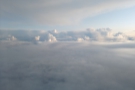 A minute later, we emerged above the clouds.