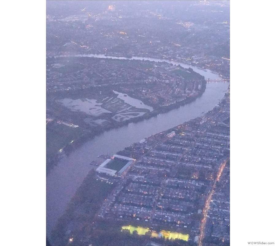 The flight path took us briefly across the river to Fulham, with Craven Cottage below...