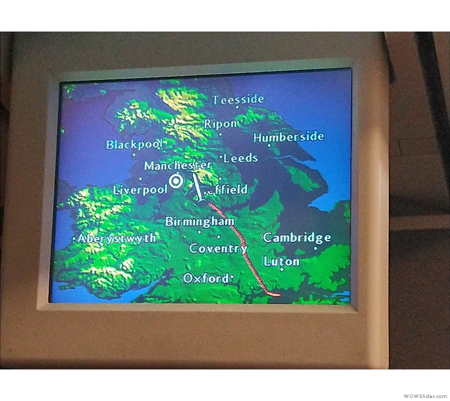 ... overhead monitors. 20 minutes into the flight and we were approaching Manchester...