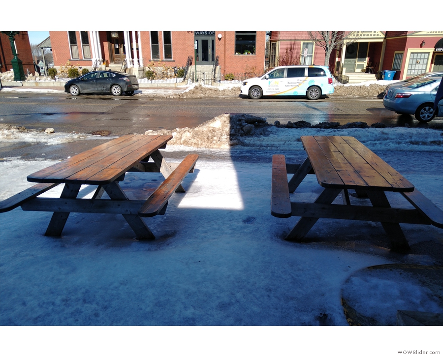 You're welcome to sit outside at the picnic tables on the forecourt...