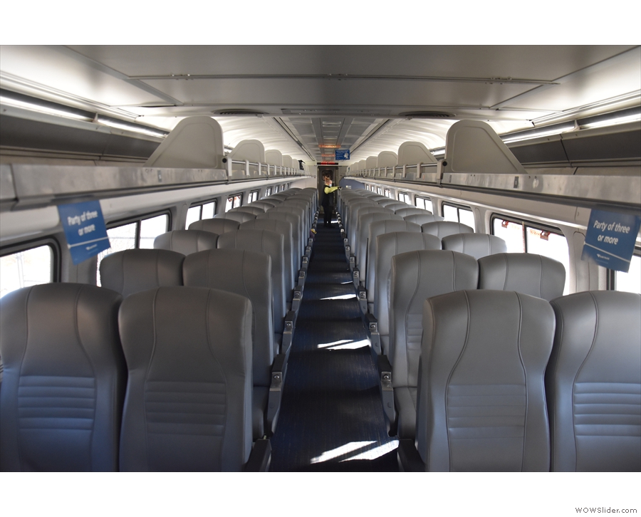 In each coach class carriage, the seats are arranged so that one half point towards the...