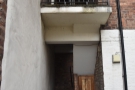 ... in turn giving access to a narrow stairway, which doubles back on itself.